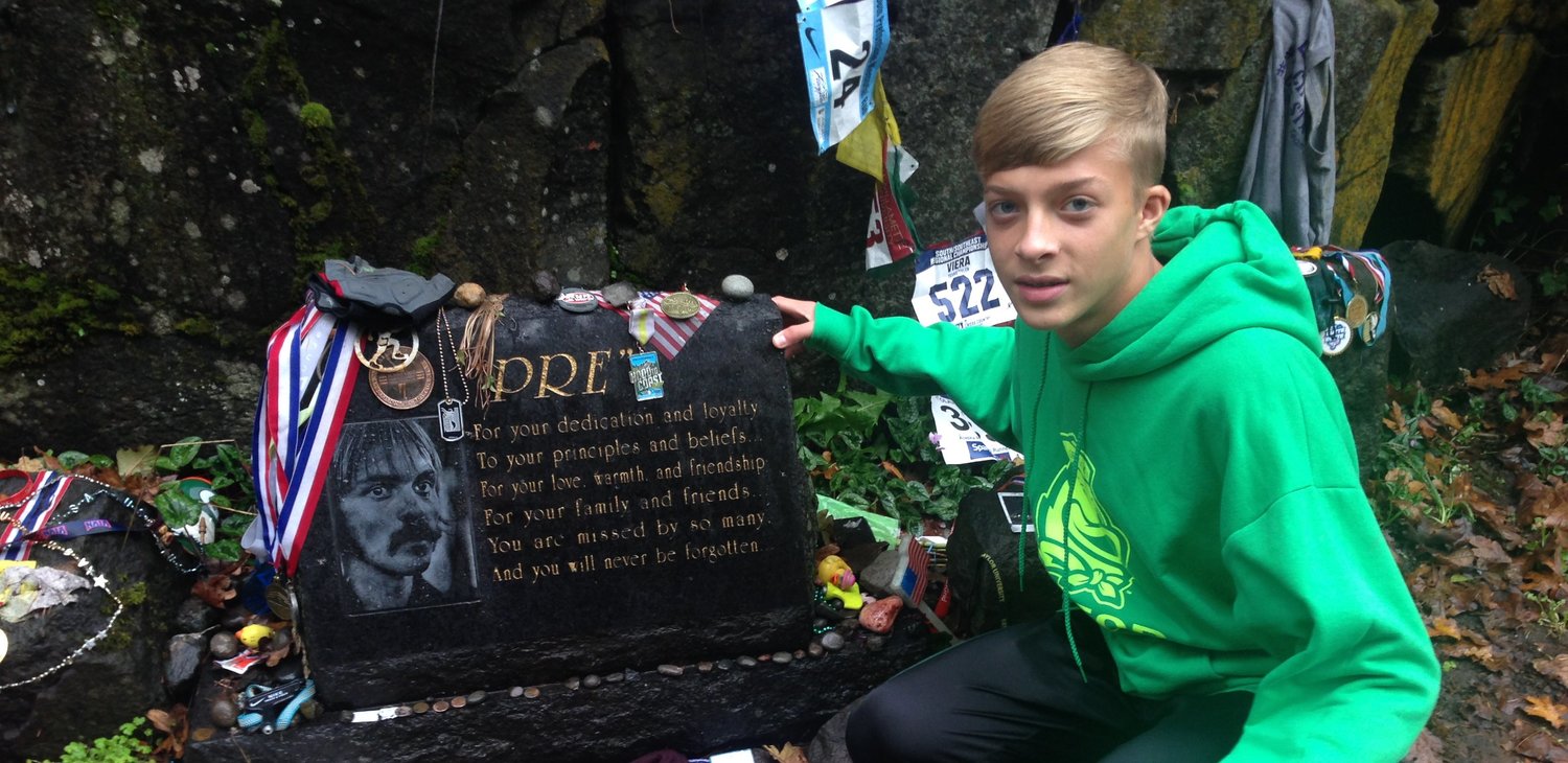 Visiting “Pre’s Rock,” a memorial dedicated to the life of record-setting runner Steve Prefontaine in Eugene, Oregon.